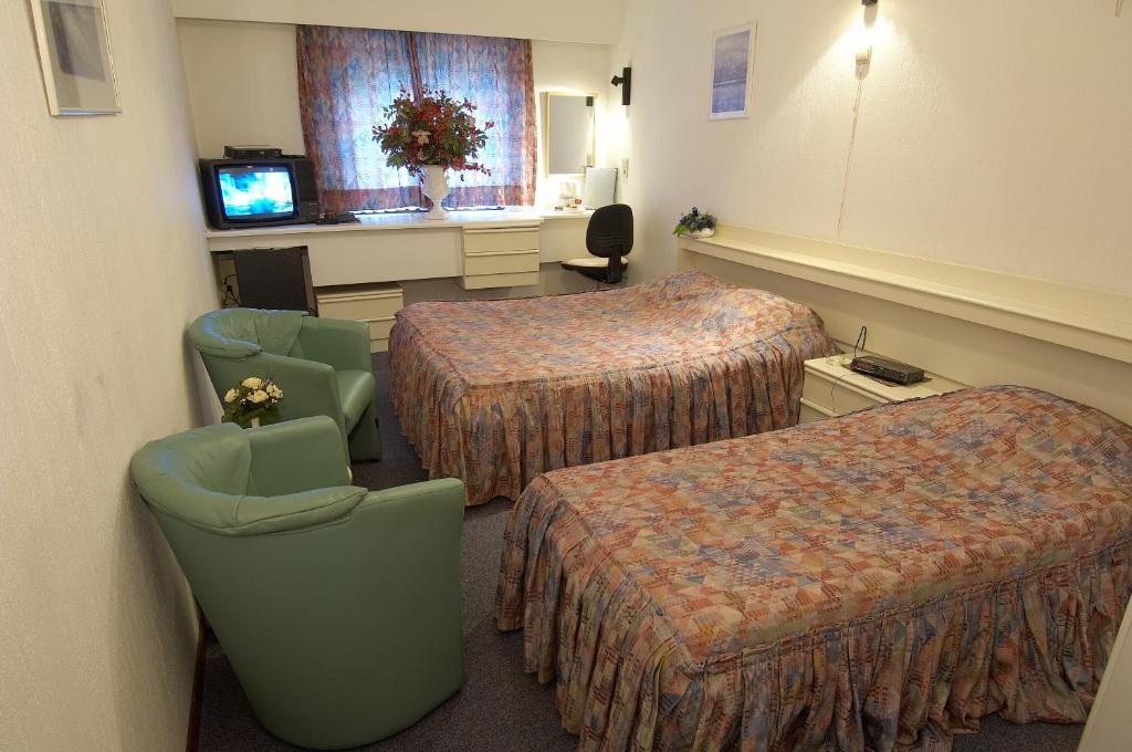 Hotel Apollo Zutendaal Ruang foto